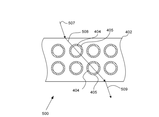 Another simplified illustration of a portion of a relatively transparent composite in accordance with the specification
